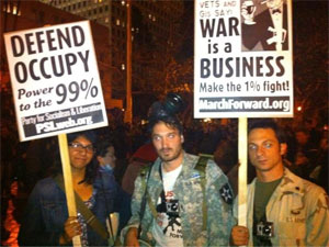 Mike Prysner at
                                                    Occupy LA with other
                                                    veterans, Nov. 29,
                                                    2011